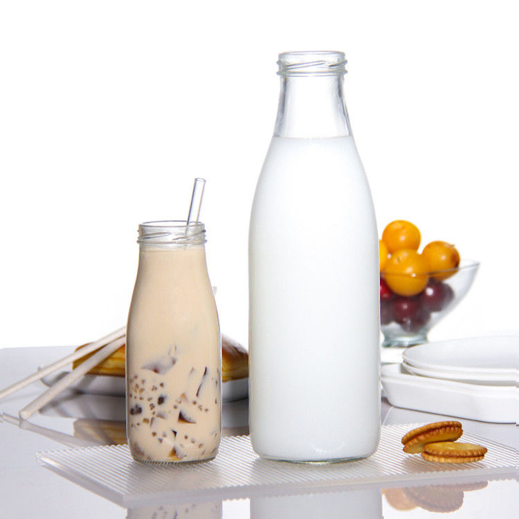 Giá nhà máy 200ml 250ml 350ml 500ml 1000ml chai nước sốt thủy tinh với nắp nhựa với nắp vít