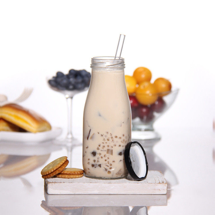 Giá nhà máy 200ml 250ml 350ml 500ml 1000ml chai nước sốt thủy tinh với nắp nhựa với nắp vít