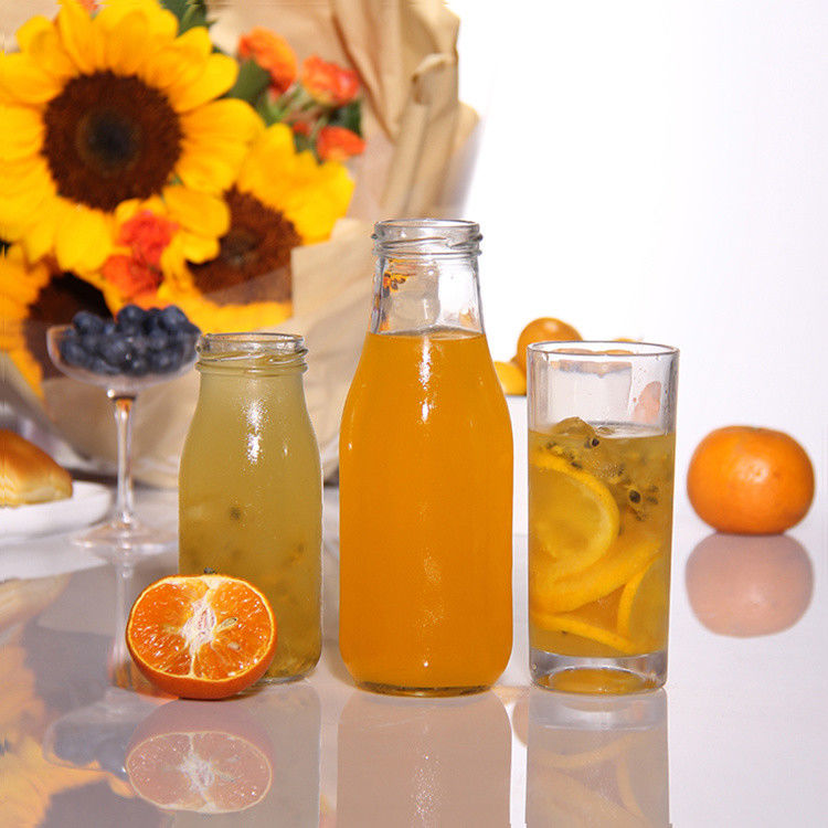 Giá nhà máy 200ml 250ml 350ml 500ml 1000ml chai nước sốt thủy tinh với nắp nhựa với nắp vít