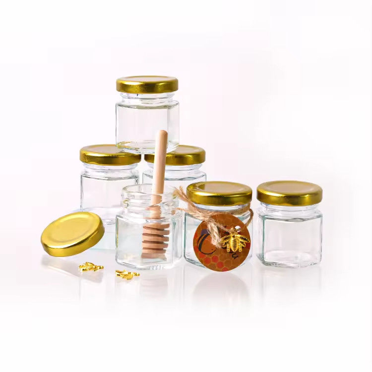 Nhãn hiệu tùy chỉnh hình lục giác 100ml 180ml 380ml lọ thủy tinh mật ong cho kẹo trái cây ô liu