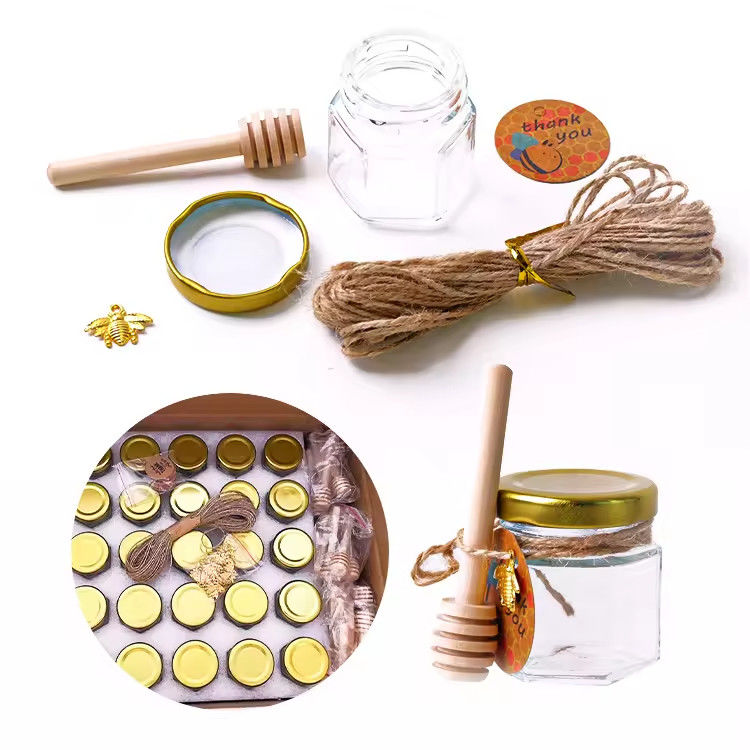 Nhãn hiệu tùy chỉnh hình lục giác 100ml 180ml 380ml lọ thủy tinh mật ong cho kẹo trái cây ô liu