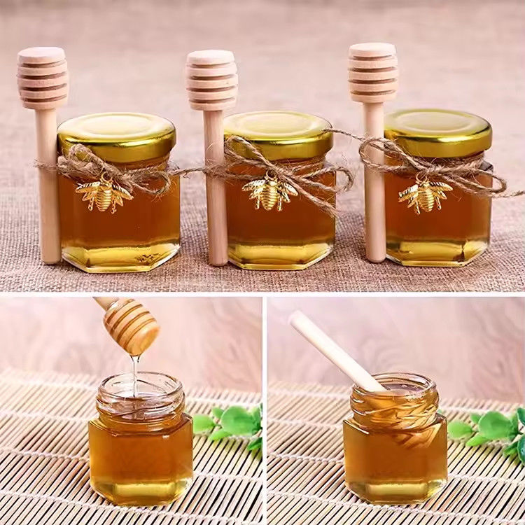 Nhãn hiệu tùy chỉnh hình lục giác 100ml 180ml 380ml lọ thủy tinh mật ong cho kẹo trái cây ô liu