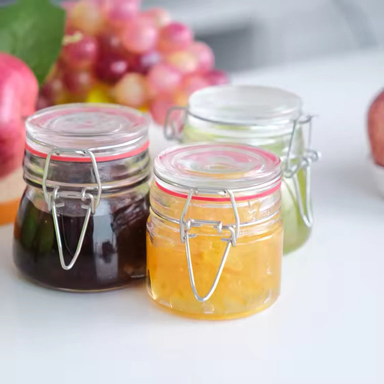 Popular Wholesale 100ml 180ml 280ml Food Grade Round Honey Glass Jar With Clip Cover (Tấm lọ thủy tinh tròn mật ong với nắp clip)