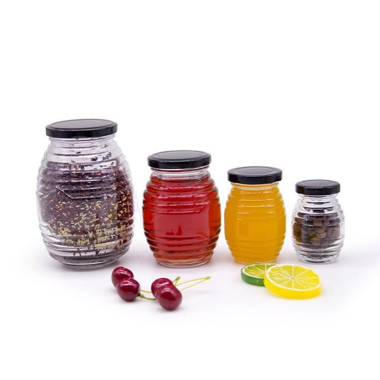 Nhãn hiệu tùy chỉnh hình lục giác 100ml 180ml 380ml Thủy tinh nước ép mật ong cho mật ong trái ô liu