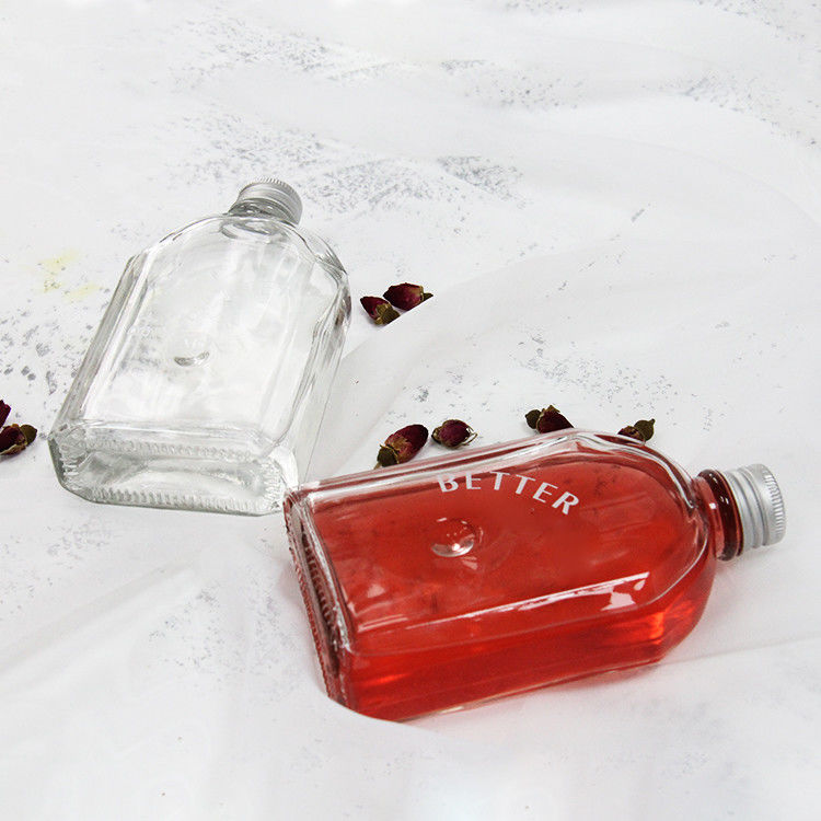 Thiết kế mới 200Ml 250Ml 300Ml chai thủy tinh trong suốt bằng chai phẳng với nắp vít