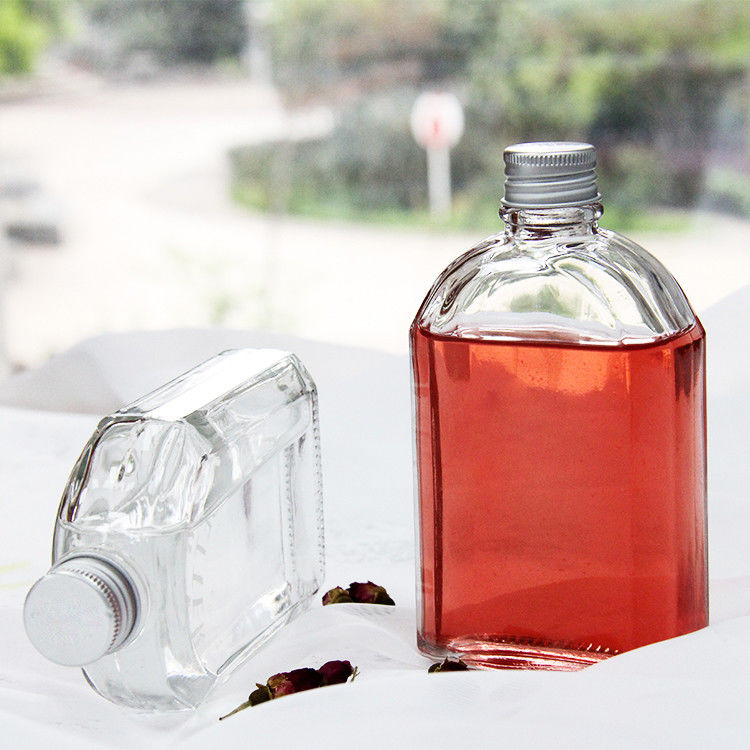 Thiết kế mới 200Ml 250Ml 300Ml chai thủy tinh trong suốt bằng chai phẳng với nắp vít