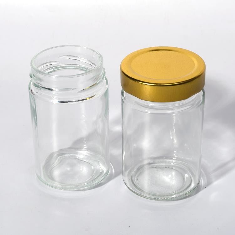Nhà máy thực phẩm sử dụng 1Oz 4Oz 8Oz hình tròn Khung lưu trữ rỗng rõ ràng Glass Jelly Jam Honey Sauce Jar