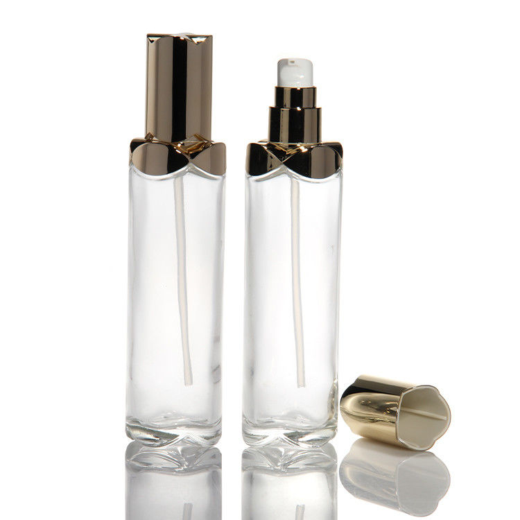 Kem mặt mỹ phẩm chai thủy tinh chai dầu thiết yếu 100ml 150ml với bơm kem dưỡng da để đóng gói mỹ phẩm