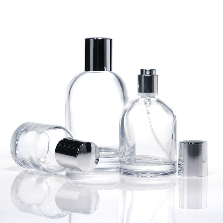 Chiếc chai nước hoa kính tròn 30ml 50ml 100ml có tường dày hình vuông với nắp gỗ và hộp thiết kế tùy chỉnh