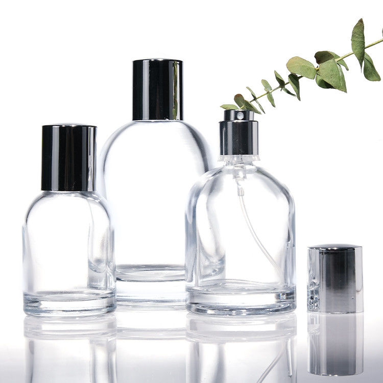 Chiếc chai nước hoa kính tròn 30ml 50ml 100ml có tường dày hình vuông với nắp gỗ và hộp thiết kế tùy chỉnh