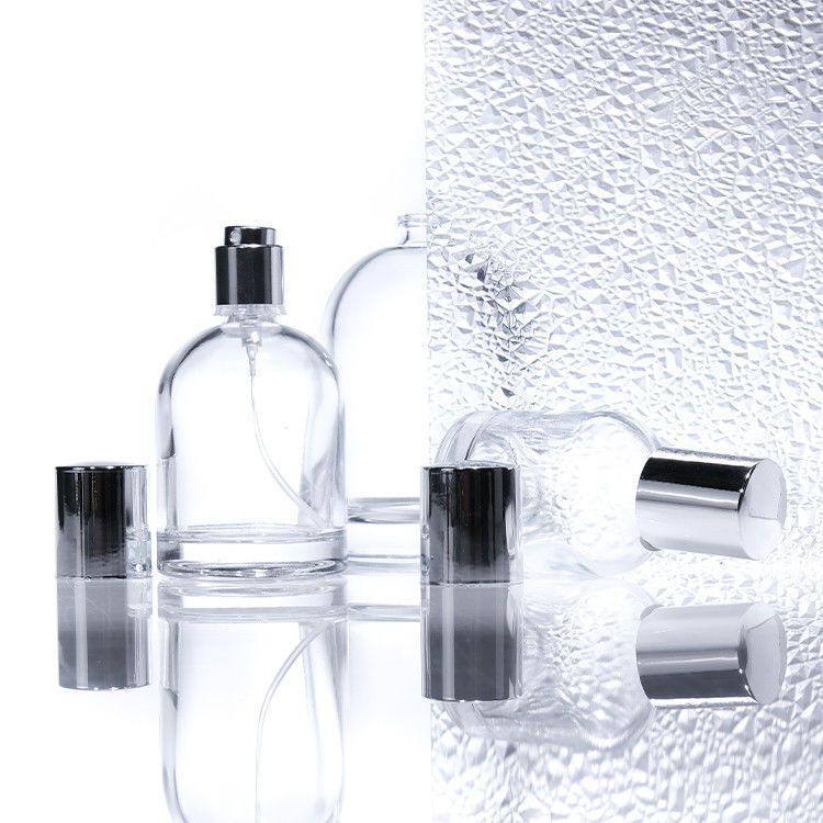 Chiếc chai nước hoa kính tròn 30ml 50ml 100ml có tường dày hình vuông với nắp gỗ và hộp thiết kế tùy chỉnh