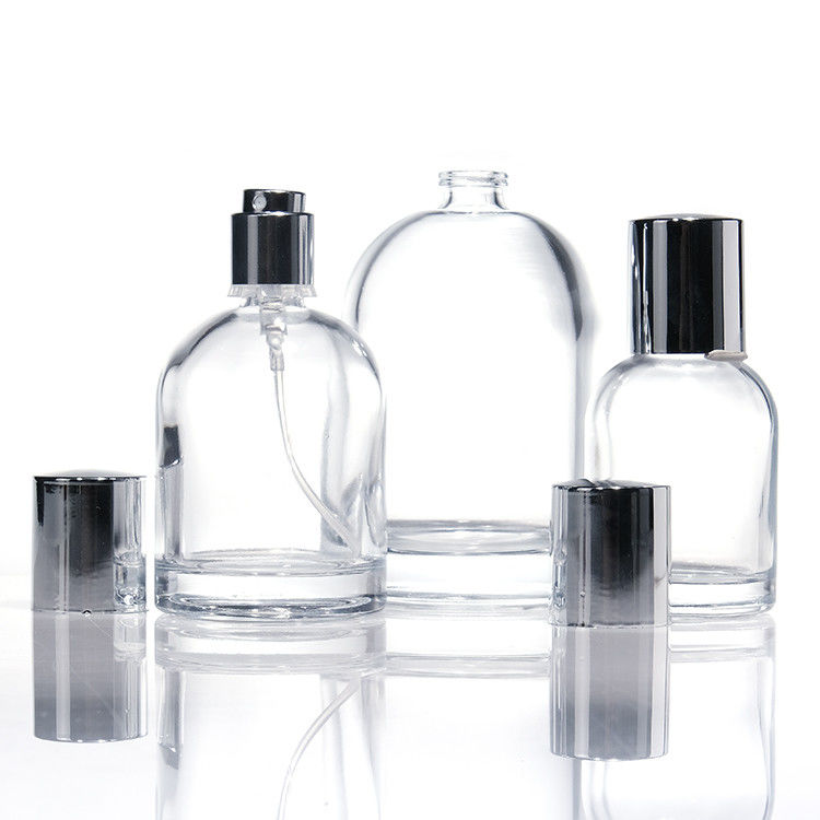 Chiếc chai nước hoa kính tròn 30ml 50ml 100ml có tường dày hình vuông với nắp gỗ và hộp thiết kế tùy chỉnh